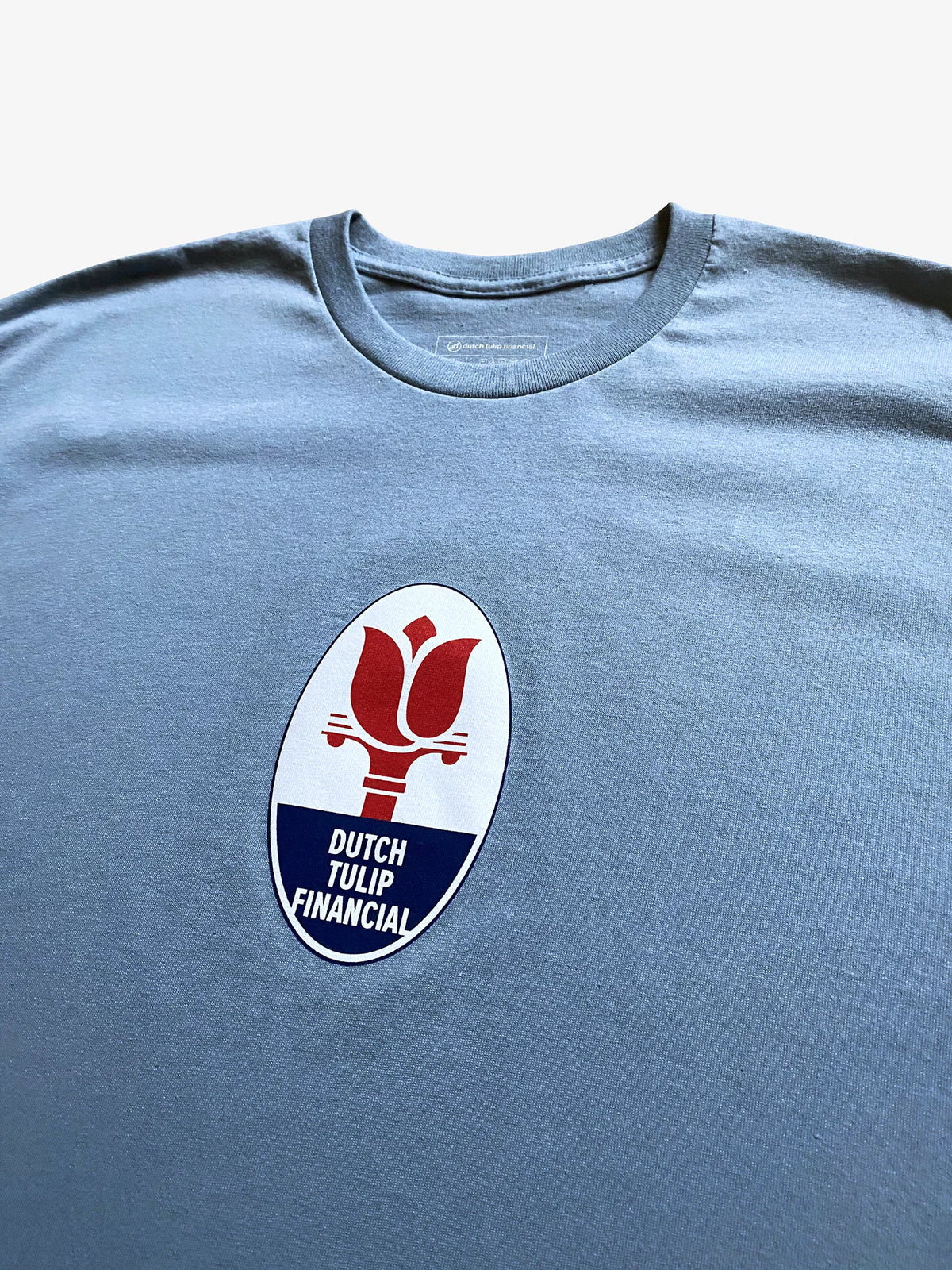 DUTCH TULIP FINANCIAL TRIDENT TEE 'STONE BLUE'